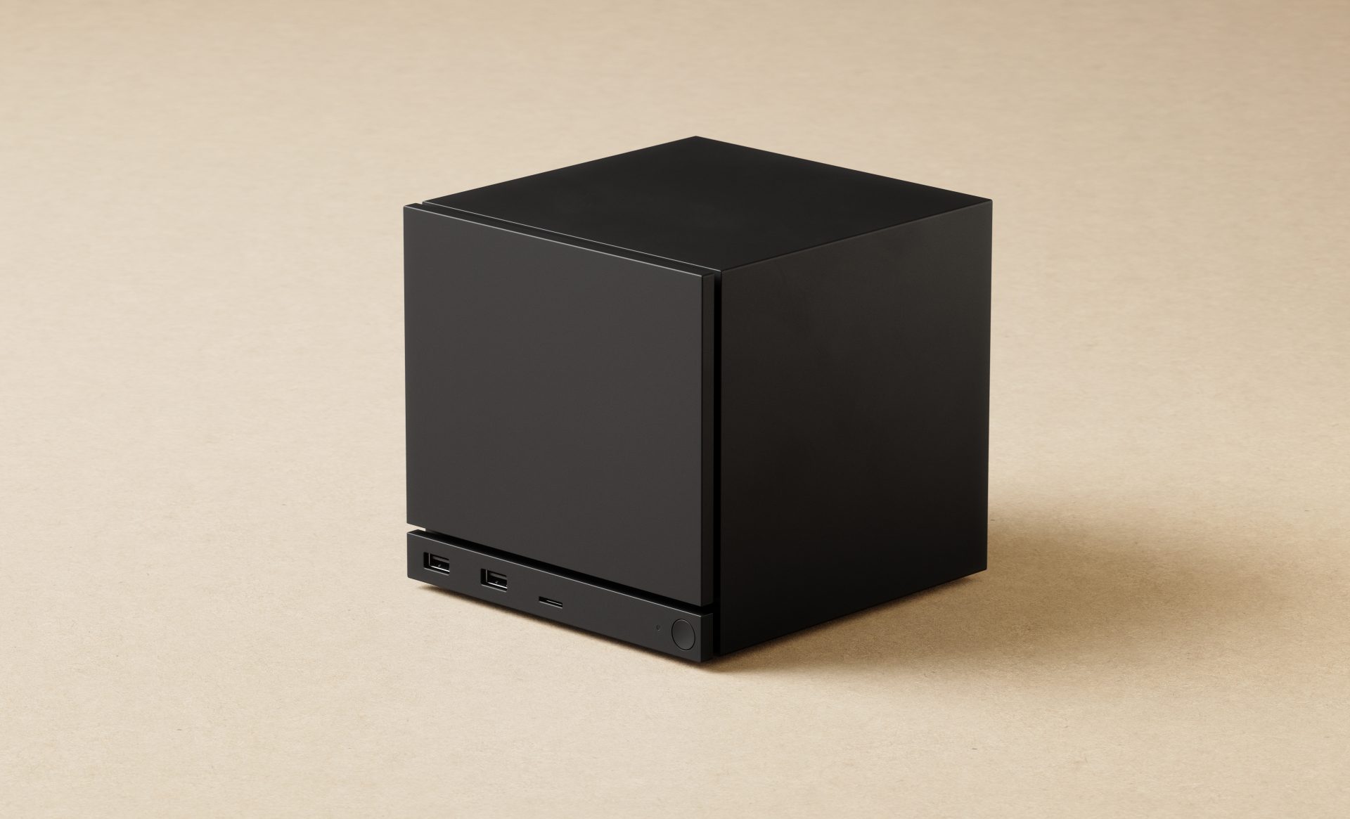 Valve Steam Machine fekete, kocka alakú házban, világos háttéren.