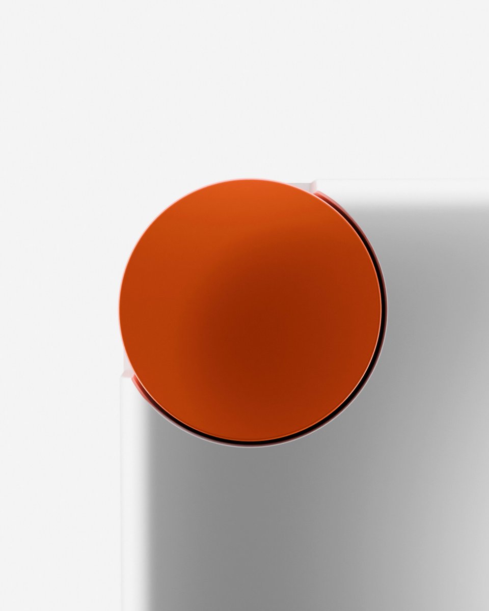 Narancsszínű smart dial részlet a CMF Buds Neo hivatalos teaserében látható töltőtokon.