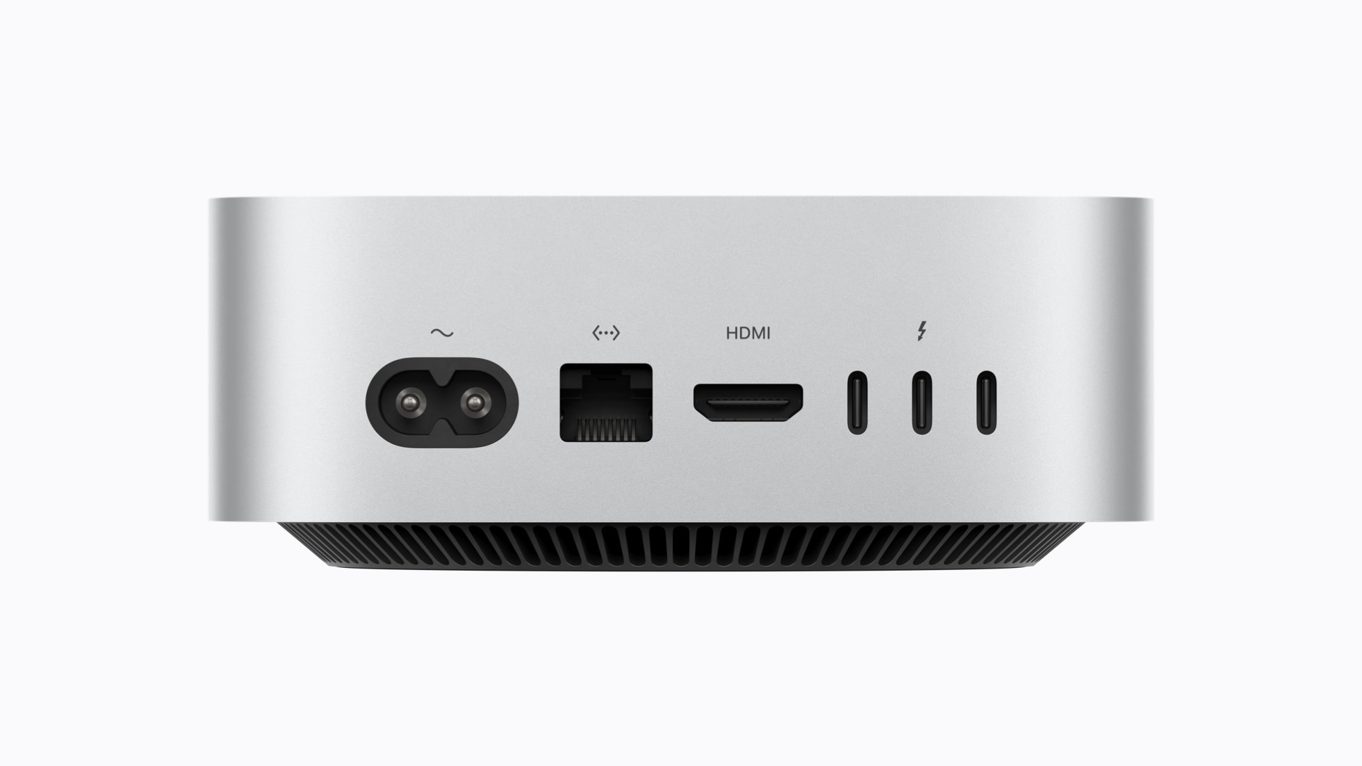 A Mac mini hátoldala tápcsatlakozóval, Ethernettel, HDMI-vel és három Thunderbolt porttal.